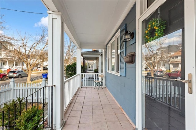 balcony featuring a porch