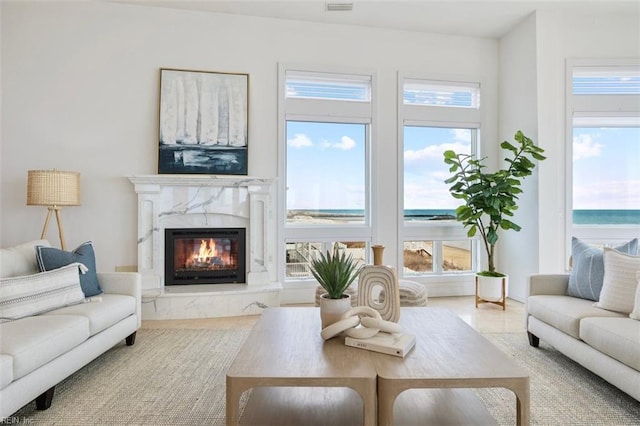 sunroom / solarium with a premium fireplace