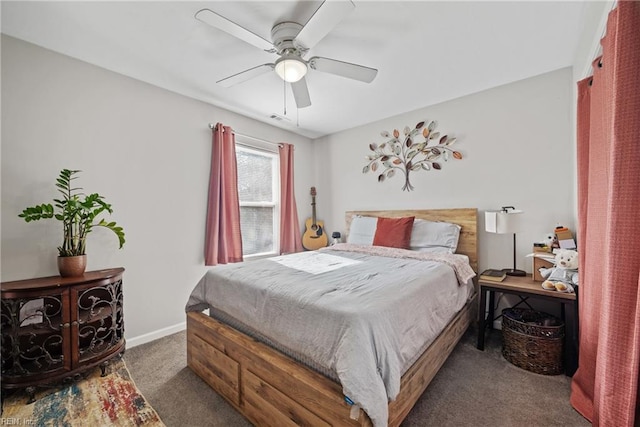 carpeted bedroom with ceiling fan, visible vents, and baseboards