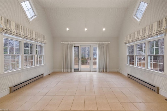 unfurnished room featuring a baseboard radiator, a skylight, light tile patterned flooring, and baseboards