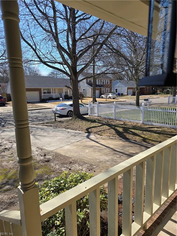 view of yard with fence and a residential view