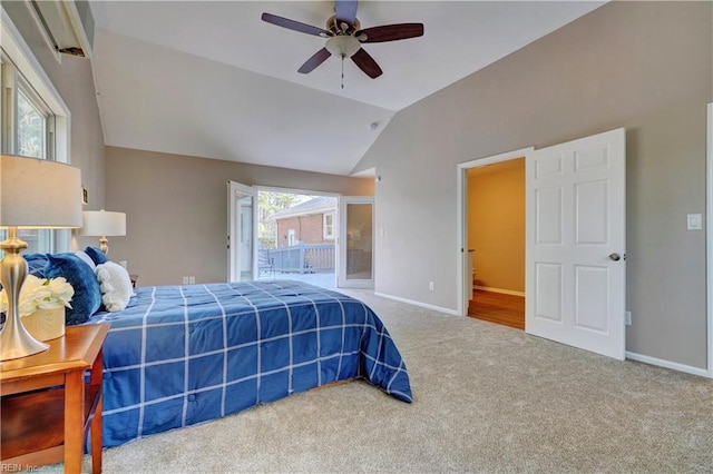 bedroom featuring lofted ceiling, carpet, baseboards, and a ceiling fan