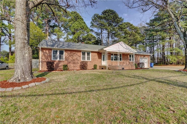 single story home featuring brick siding, crawl space, a garage, driveway, and a front lawn