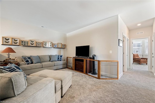 living room with baseboards, visible vents, carpet flooring, and recessed lighting