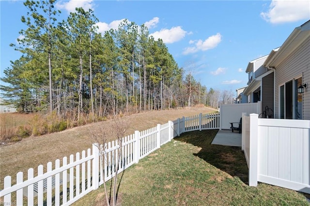 view of yard featuring a fenced backyard