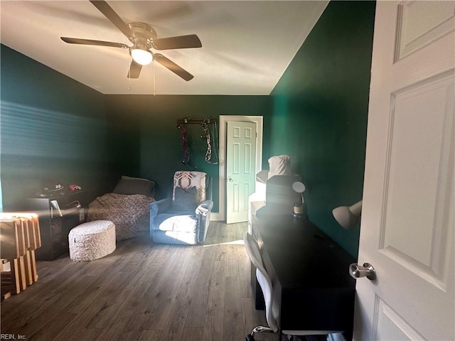 bedroom with wood finished floors and a ceiling fan