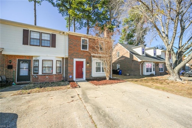 view of property with brick siding