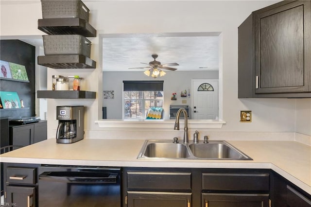 kitchen featuring light countertops, dishwasher, a sink, and ceiling fan