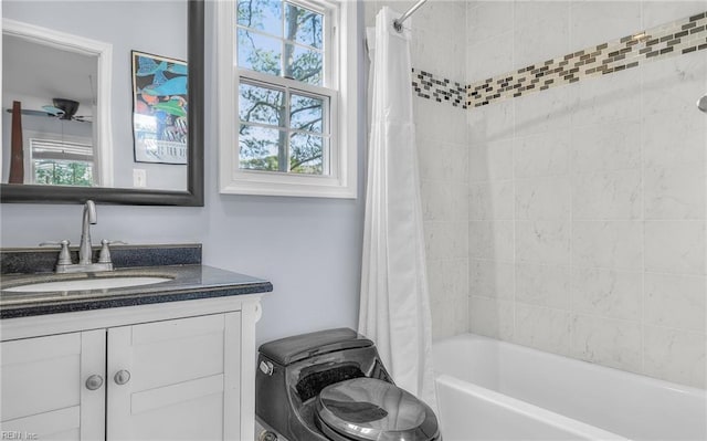 full bathroom featuring shower / tub combo with curtain and vanity