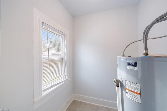 utility room with water heater