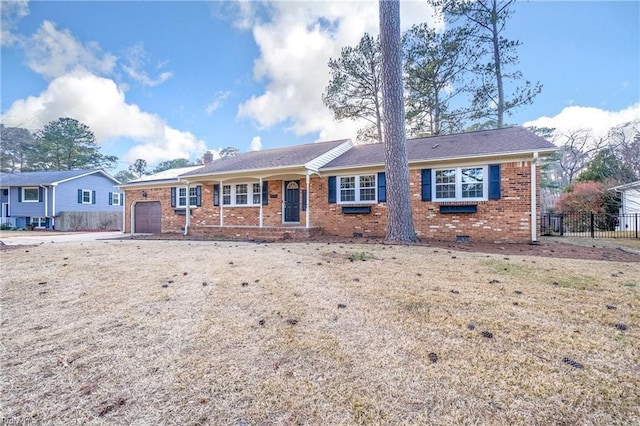 single story home featuring crawl space, brick siding, fence, and an attached garage