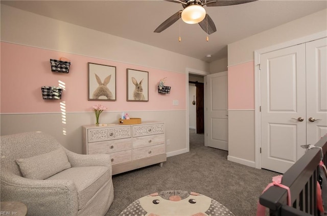 living area with ceiling fan, carpet, and baseboards