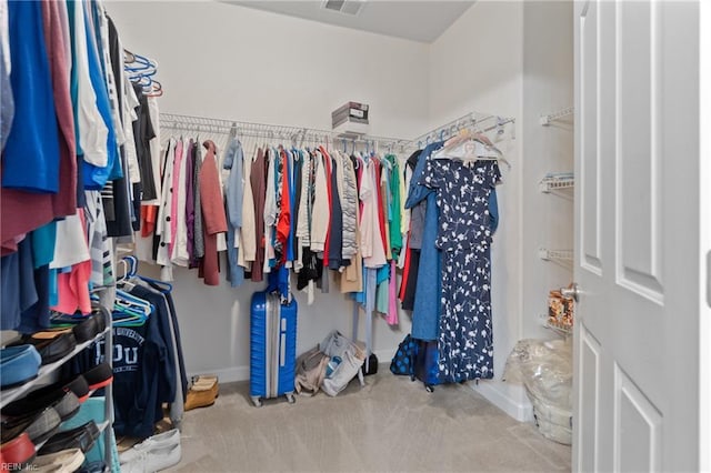 walk in closet with carpet and visible vents