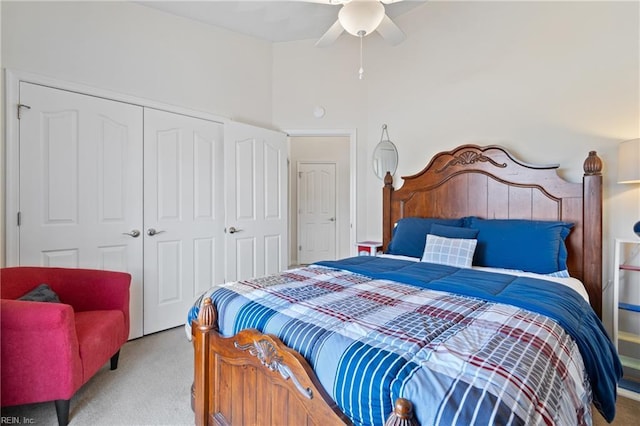 bedroom featuring carpet, a closet, and ceiling fan