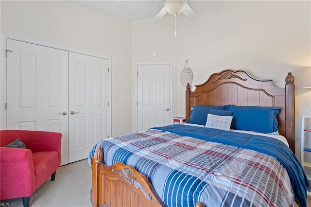 carpeted bedroom featuring a closet and ceiling fan