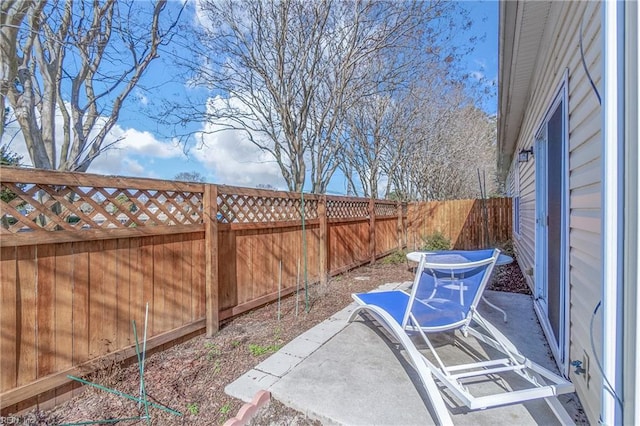 view of patio with a fenced backyard