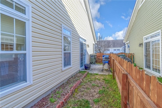 exterior space with a patio area and fence