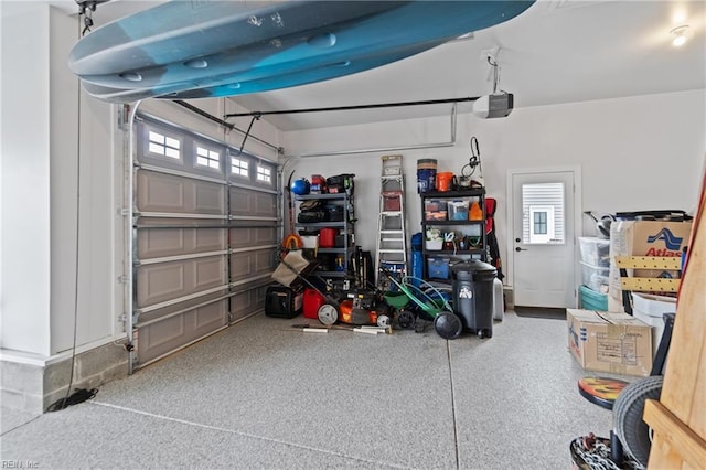 garage featuring a garage door opener