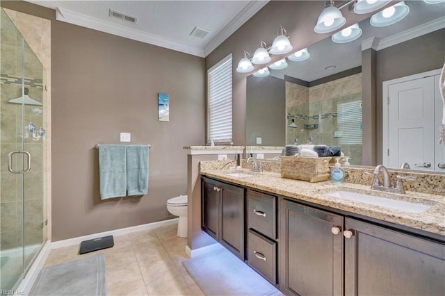 bathroom featuring ornamental molding, visible vents, and a sink