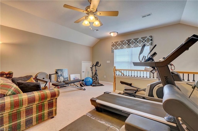 exercise area featuring baseboards, visible vents, a ceiling fan, lofted ceiling, and carpet floors