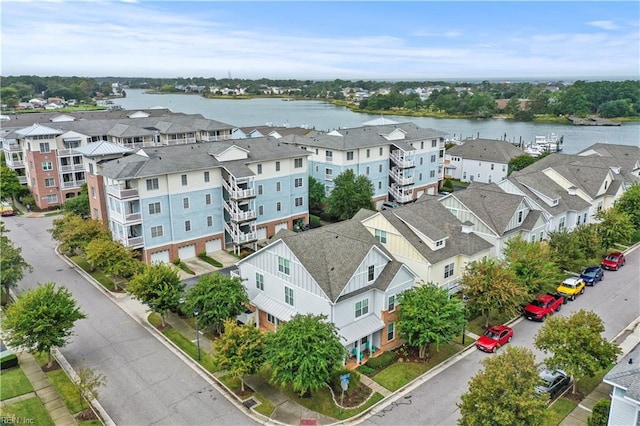 aerial view featuring a water view and a residential view