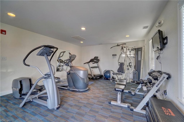 exercise room with baseboards, visible vents, carpet flooring, and recessed lighting