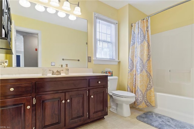 full bathroom with shower / bath combo with shower curtain, vanity, and toilet