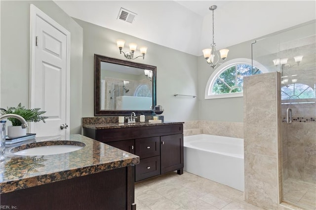 bathroom with visible vents, a sink, a shower stall, and a bath