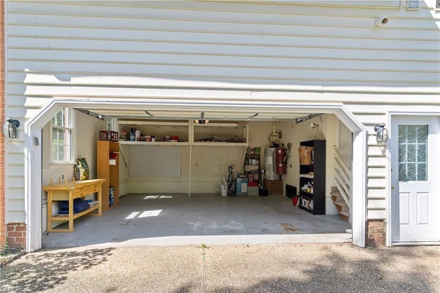 garage featuring water heater