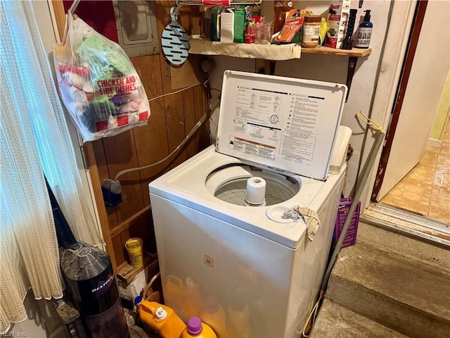 washroom with washer / clothes dryer and laundry area