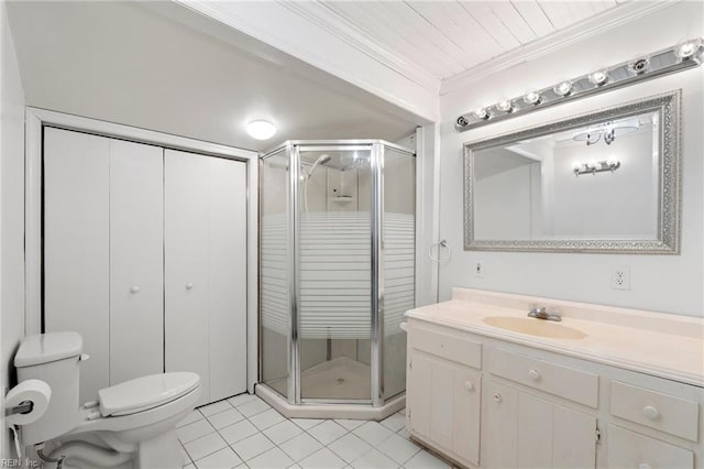 full bath with crown molding, toilet, a shower stall, vanity, and tile patterned flooring