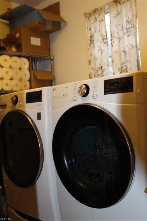 laundry room featuring independent washer and dryer