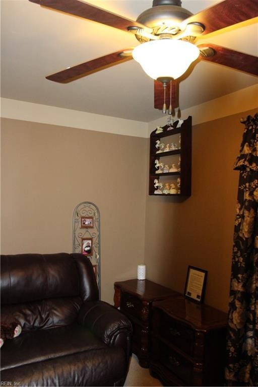 living room with a ceiling fan