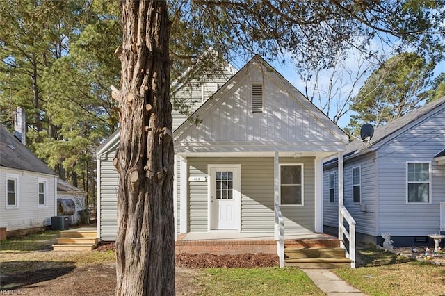 view of front of house featuring central air condition unit and a porch