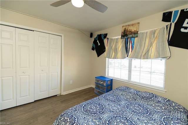 bedroom with baseboards, a closet, a ceiling fan, and wood finished floors