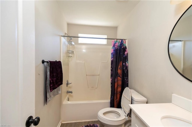 bathroom featuring vanity, toilet, and shower / tub combo with curtain