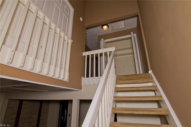 staircase with baseboards