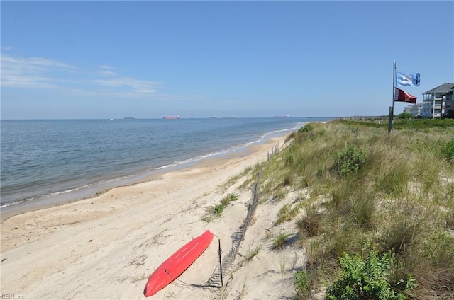 property view of water featuring a beach view