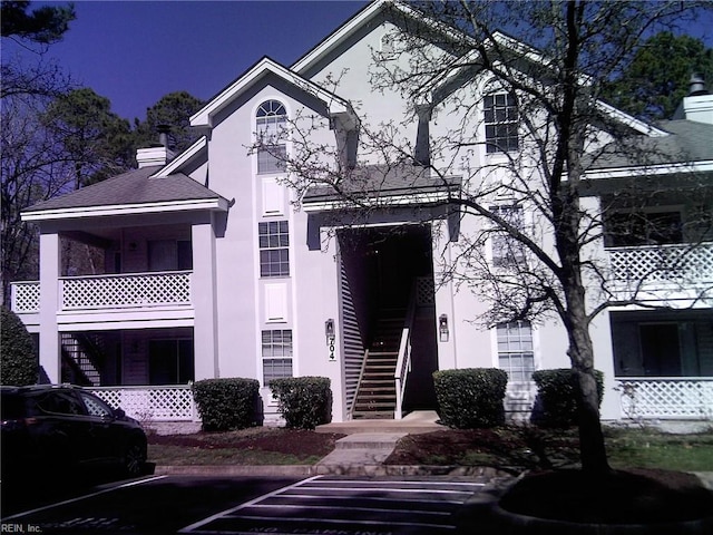 view of building exterior with stairway