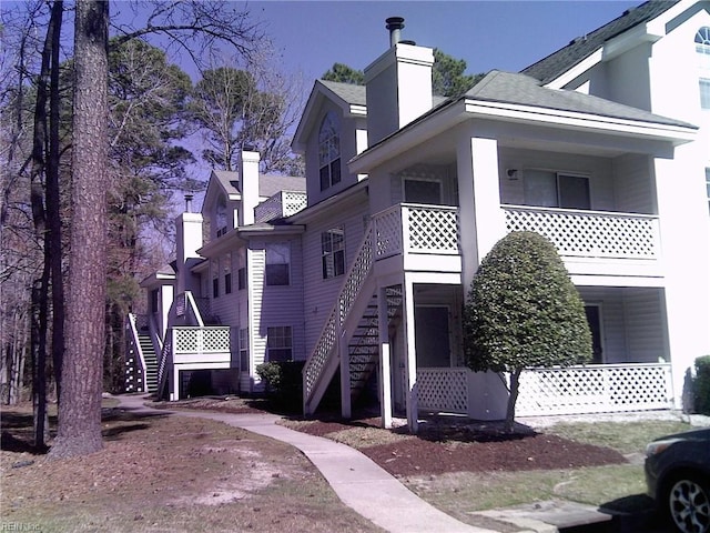 view of building exterior featuring stairs