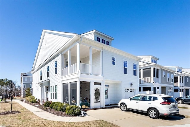 view of front of property with concrete driveway