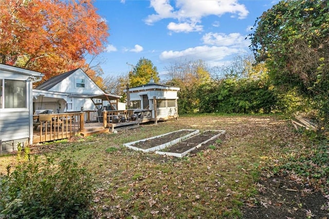 view of yard featuring a deck