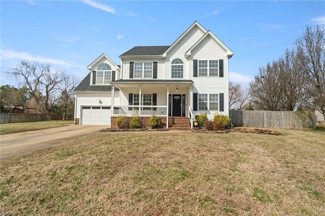 view of front of property featuring concrete driveway, a porch, a front lawn, and fence