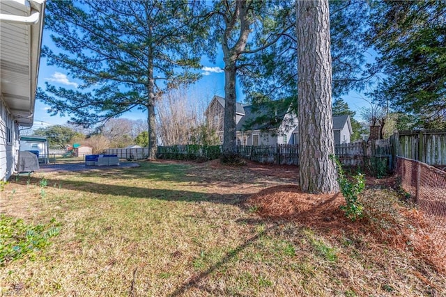 view of yard featuring a fenced backyard