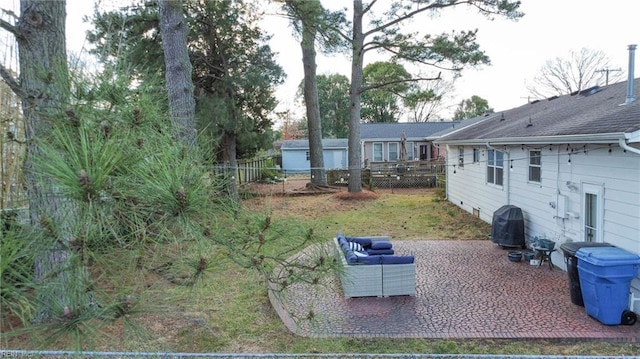 view of yard with a patio and fence