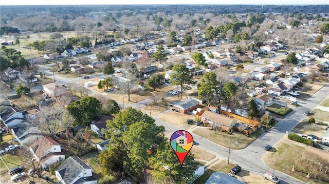 birds eye view of property with a residential view