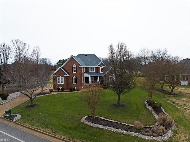 view of front of home with a front lawn