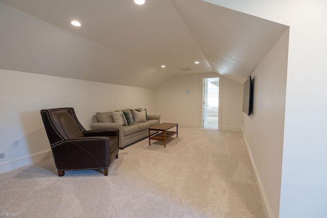 living area featuring recessed lighting, light carpet, vaulted ceiling, and baseboards