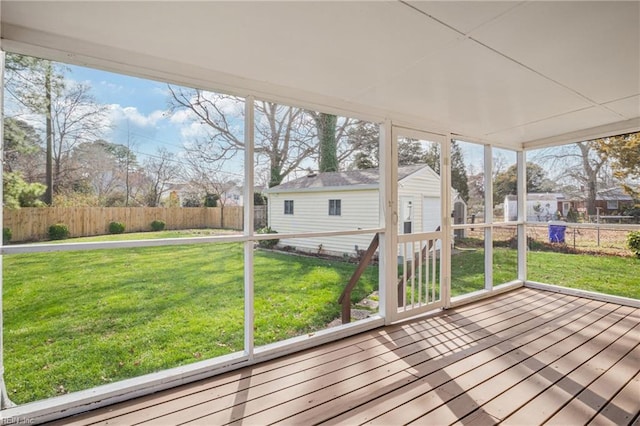 unfurnished sunroom featuring a healthy amount of sunlight