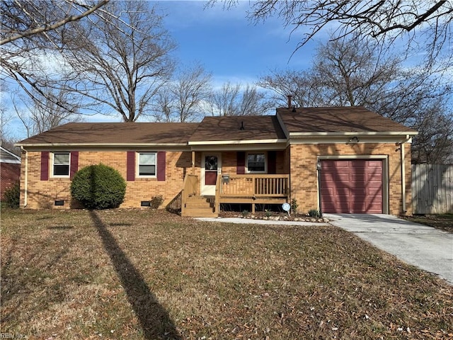 ranch-style house featuring driveway, brick siding, crawl space, and an attached garage